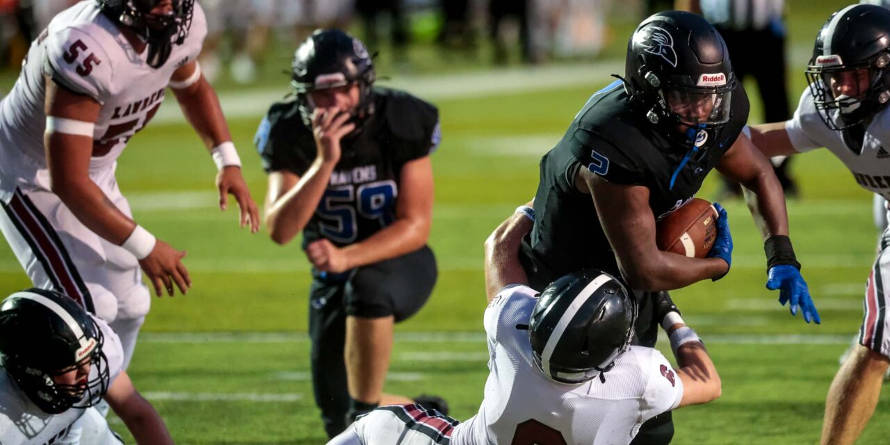 ‘A lot of things to fix’: Lawrence football upended by Olathe Northwest, falls to 0-3 