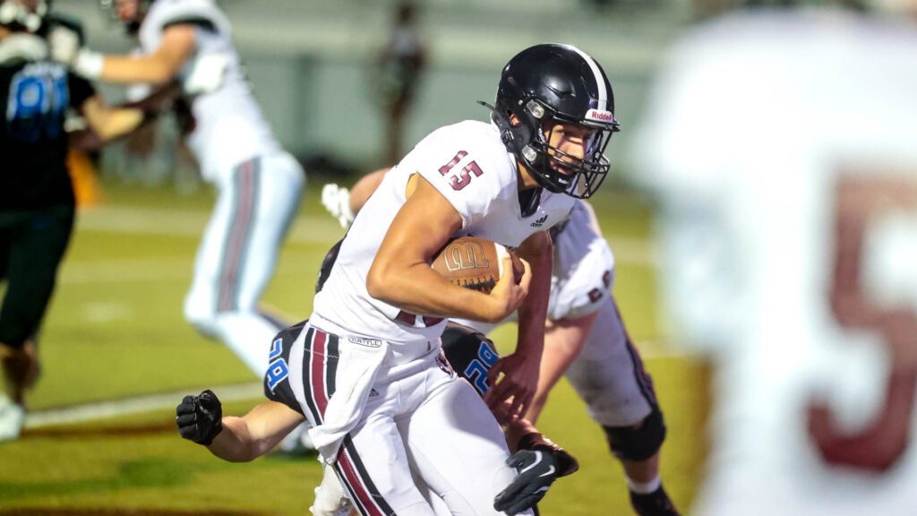 Lawrence football vs. Olathe Northwest, Week 3-12