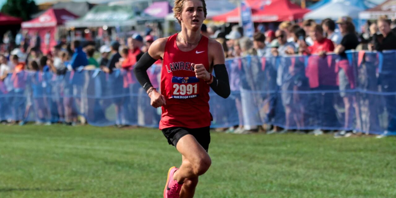 Lawrence’s Schwartz takes 4th in Manhattan Invitational boys cross country race, leads Lions to 5th place team finish