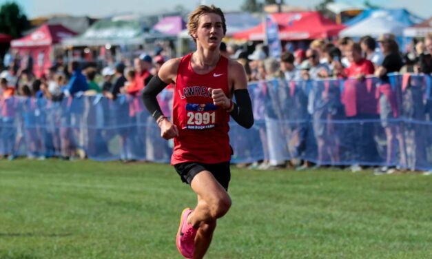 Lawrence’s Schwartz takes 4th in Manhattan Invitational boys cross country race, leads Lions to 5th place team finish