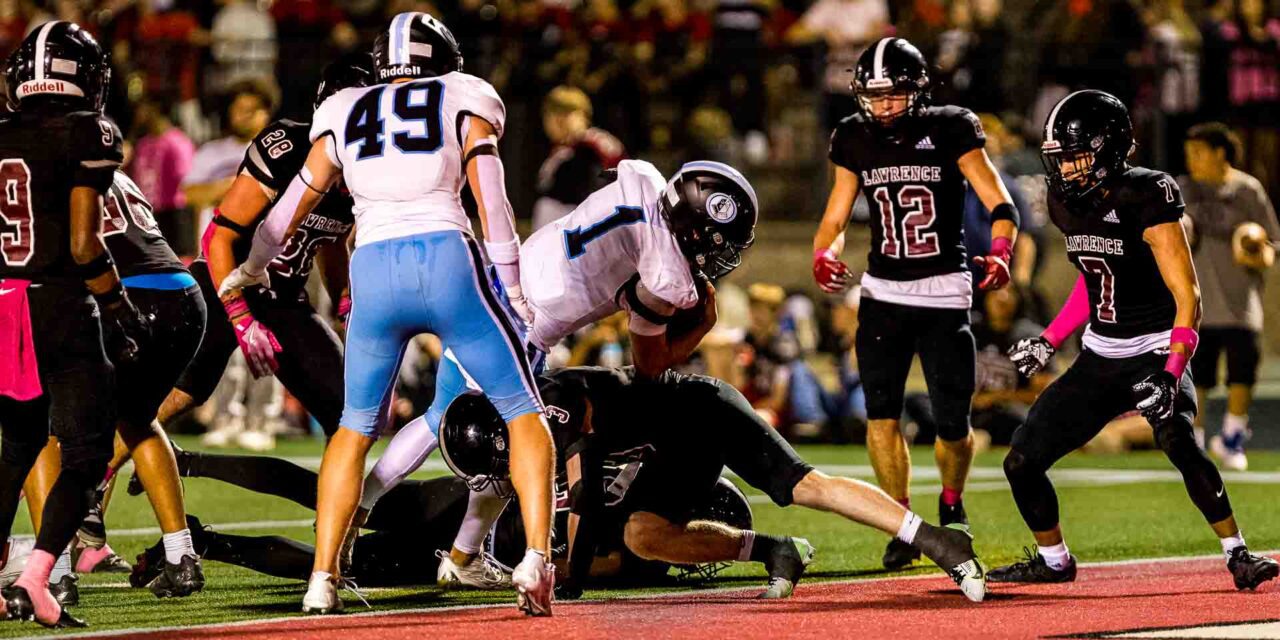 Reeves, Shawnee Mission East hand Lawrence 28-20 defeat during Lions’ homecoming